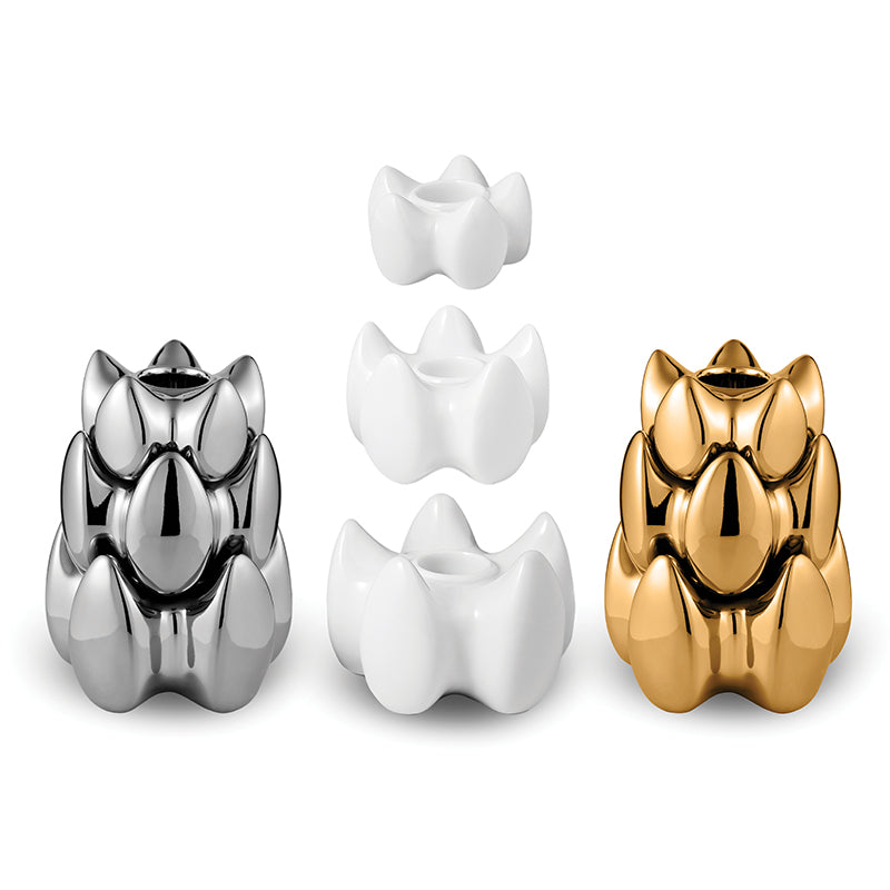 Inspired by a lotus flower. Candle holder made of porcelain by designteam from Hong Kong. Handmade and glazed white, silver or gold. Online JAHOKO